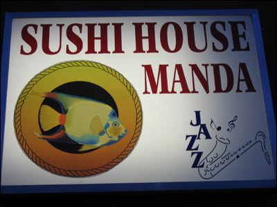 Sushi House Manda sign up close