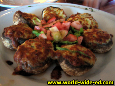 Stuffed Mushrooms - stuffed with petro & quattro formaggio, baked until golden for $6.95