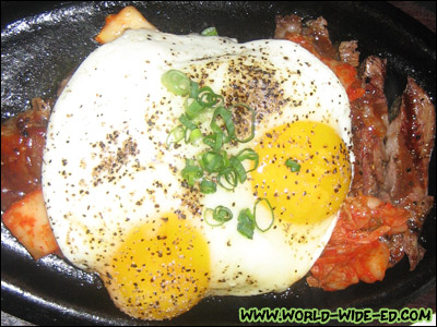 Kim Chee Ribeye Steak with Kim Chee and Two Fried Eggs (12oz - $16, 16oz - $22)