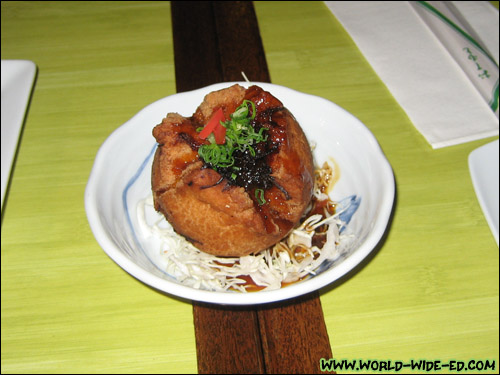 Shoyu Pork Andagi - Crispy andagi batter surrounding a shoyu pork filling. Served with a shoyu pork sauce and yuzu beurre blanc. $3 each
