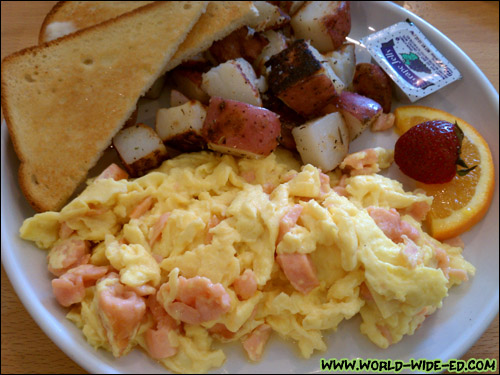 Lox and Eggs Scramble - Scrambled eggs and onions with smoked salmon. ($10.50)