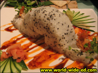 The Bomb-ucha (Bumbucha) Roll, $16 - Crispy shrimp tempura, unagi, crab, kaiware, and cucumber with 3 special sauces