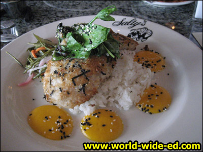 Panko and Nori-Crusted Alaskan Halibut - with Lemongrass scented sticky rice, black bean wilted pea vines, sunomono salad, and a spring carrot vinaigrette ($29.95)