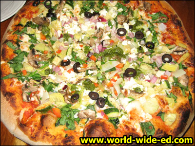 Kula Lodge Garden Fresh Vegetarian Pizza - Thick hand tossed dough with our Grilled Seasoned Vegetables & Feta Cheese - $17