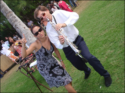 Jamie rocking out with the saxophonist (Photo courtesy of Donna Isara)