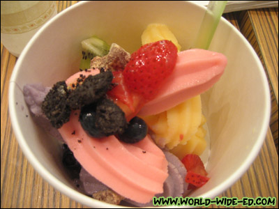 The little lady's cute, petite portion of Strawberry, Taro and Mango yogurt with fresh strawberries, blueberries, kiwi, and Oreo crumbles