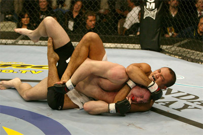 Penn puts a rear naked choke on then Welterweight Champion Matt Hughes to take the title at UFC 46: Super Natural (Photo Courtesy: UFC)