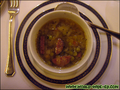 Reindeer Sausage and Vegetable Soup - Rich beef broth with sausage, diced carrot, onion, potato, green beans, peas, cabbage, fresh herbs and finished with sherry pepper to add a little extra spice.