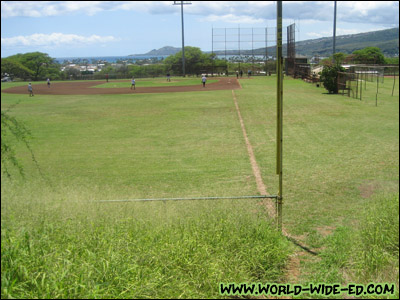 Path to the trail head starts behind the baseball fields