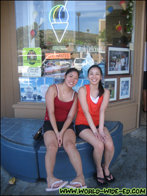 Best buds Noele and wifey are all smiles in anticipation of their shave ice.