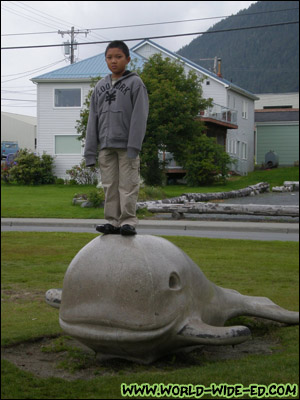 Chris on the whale statue [Photo Credit: Andi Kubota]