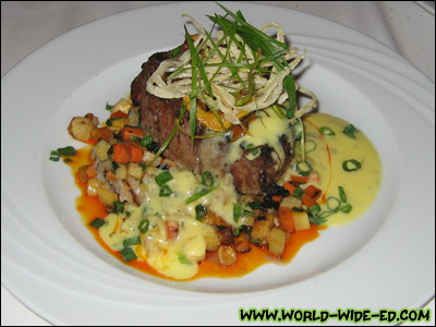 Grilled Filet of Angus Beef - Aged Cheddar Potato Cake, Roasted Root Vegetables and a Classic Bearnaise - $39