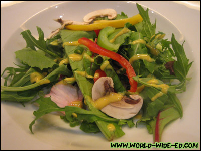 Show Salad Spectacular - Assorted baby greens, pepper rings, mushroom, scallions, and cherry tomatoes with a honey mustard dressing