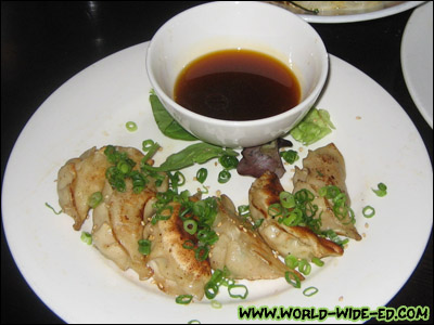 Seafood Gyoza - homemade shrimp & scallop dumplings served with chili soy - $9