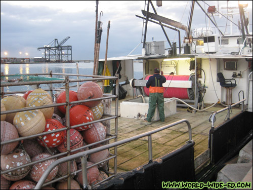 Boat unloading their catch [Photo Credit: Arthur Betts]