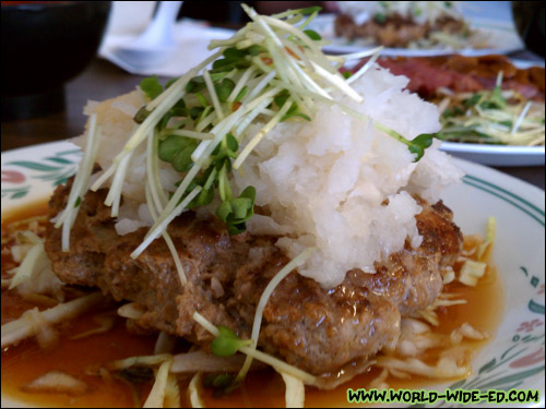 Japanese Hamburger Steak - Home-style hamburger patty topped with grated daikon, daikon sprouts, and tangy Ponzu sauce ($7.50)