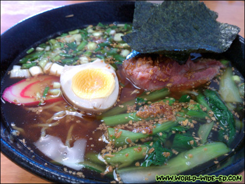 Soft Rib Ramen - Ribs are slowly cooked over 8 hours until tender & juicy. Ramen is served in a garlic shoyu base with traditional half cooked egg. Original Japanese style. - $8