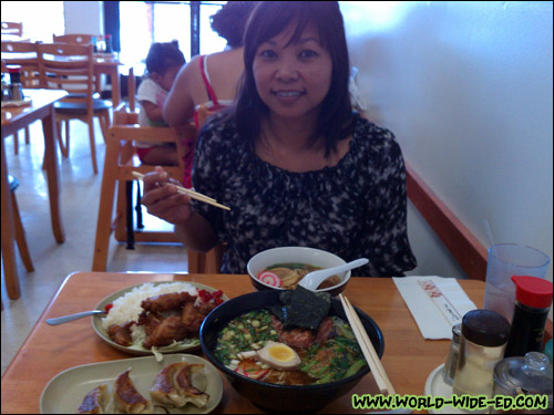 A happy looking Maribel with her Mochiko Chicken Combo - $9.45