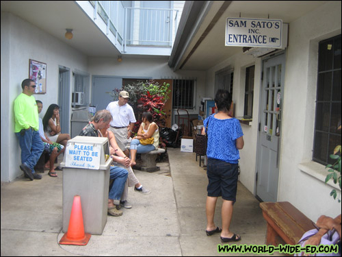 The wait outside Sam Sato's