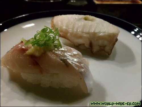 Hokkaido Tako, simmered with shoyu, massaged by hand with daikon for 45 minutes (background) & Aji (Japanese Akule) with ginger and green onions (foreground)