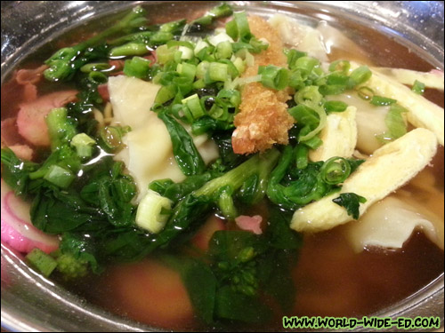 Zip Min (Saimin noodles, wun tun, breaded shrimp, choi sum, fishcake, dried seaweed, egg, sweet pork, and green onions.