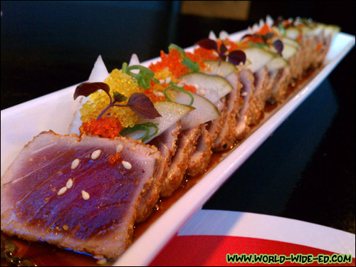 Ahi Tataki (Fresh Hawaiian Big-Eye Ahi with sunomono, yuzu, tobikko, soy vinaigrette and a dash of white truffle oil - $18)