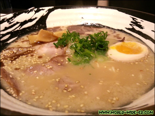 Shoyu Tonkotsu Ramen - bonito infused shoyu tare served with black sesame paste. - $10.75